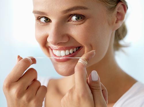 when should i floss during the day?